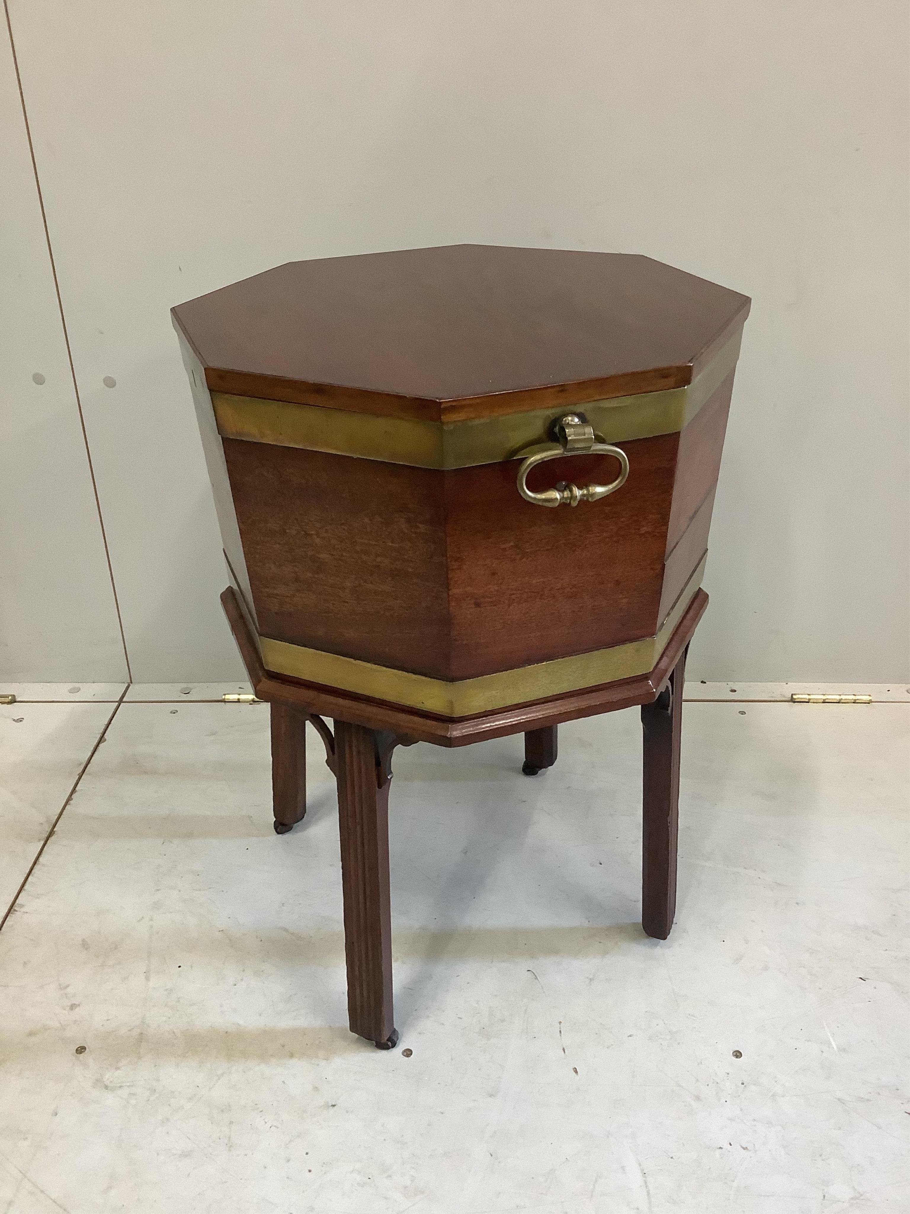 A George III and later mahogany brass bound octagonal wine cooler, width 50cm, height 63cm. Condition - good